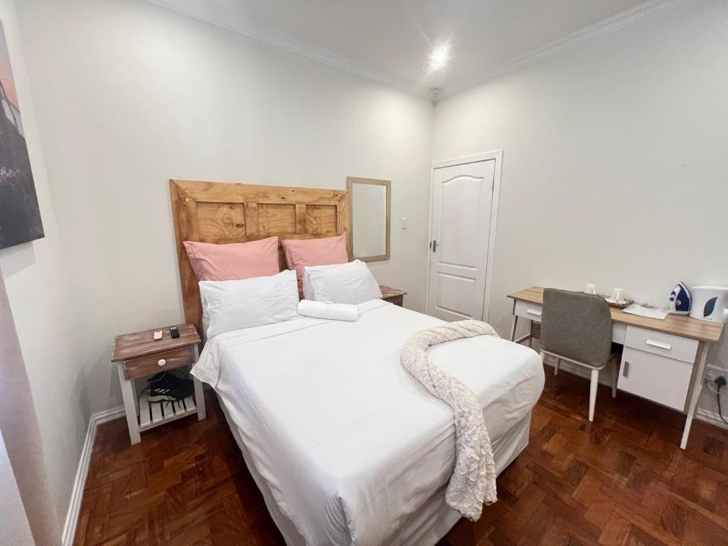 Una cama o camas en una habitación de La Vue