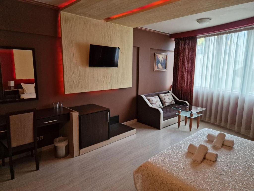 TV a/nebo společenská místnost v ubytování Hotel Gabi