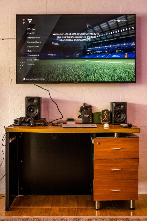 TV a/nebo společenská místnost v ubytování Joon