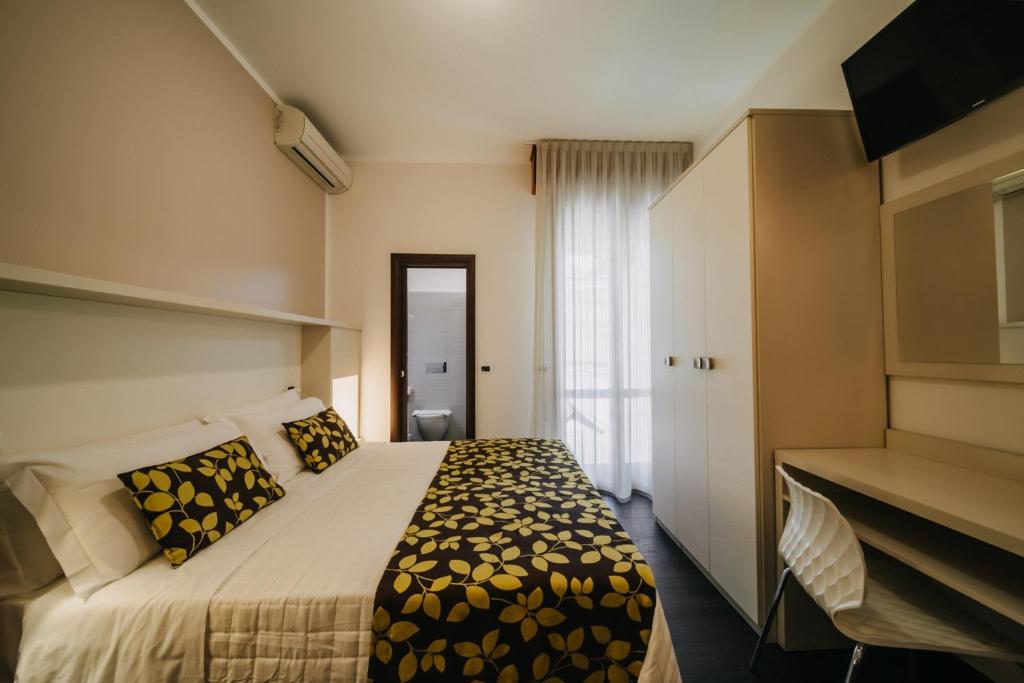Postel nebo postele na pokoji v ubytování Hotel Lalla Beauty & Relax