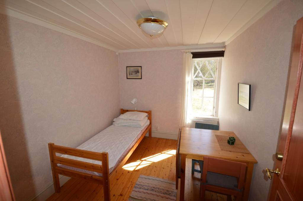 Postel nebo postele na pokoji v ubytování Statarlängan Hörnefors