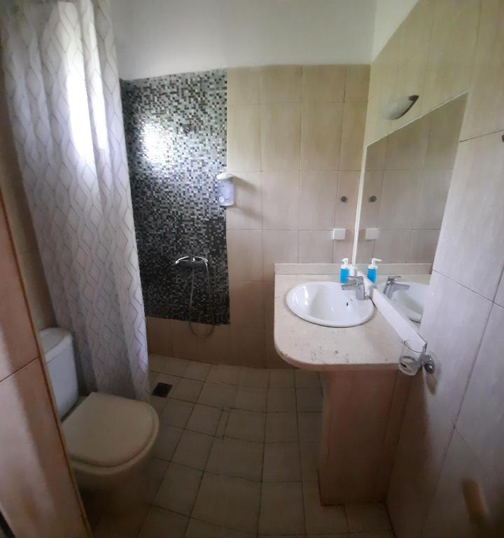 Koupelna v ubytování Avanda Rooms