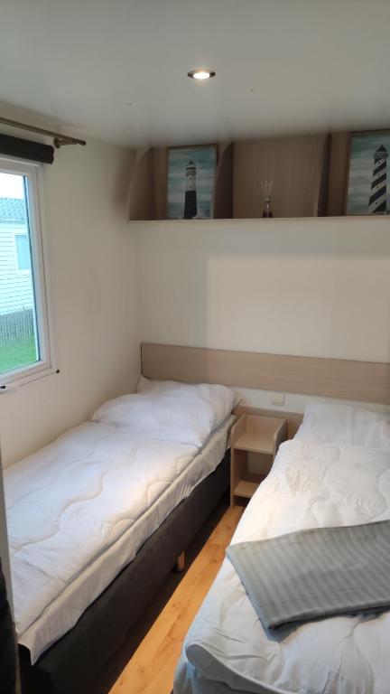 Postel nebo postele na pokoji v ubytování Bredene Haus Schildkröte