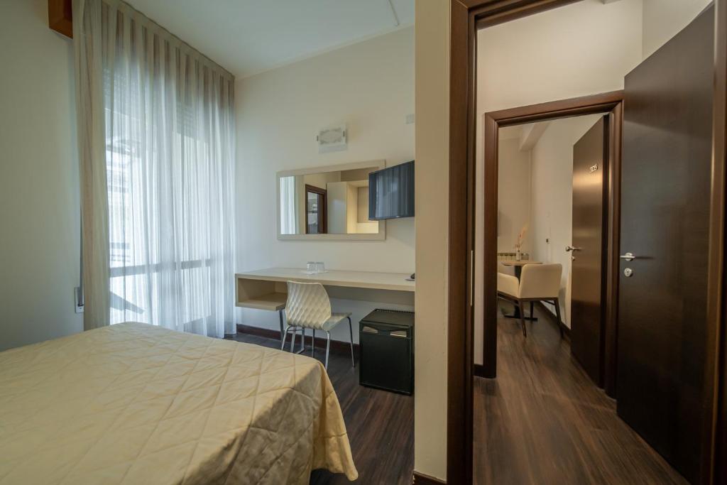 Postel nebo postele na pokoji v ubytování Hotel Lalla Beauty & Relax