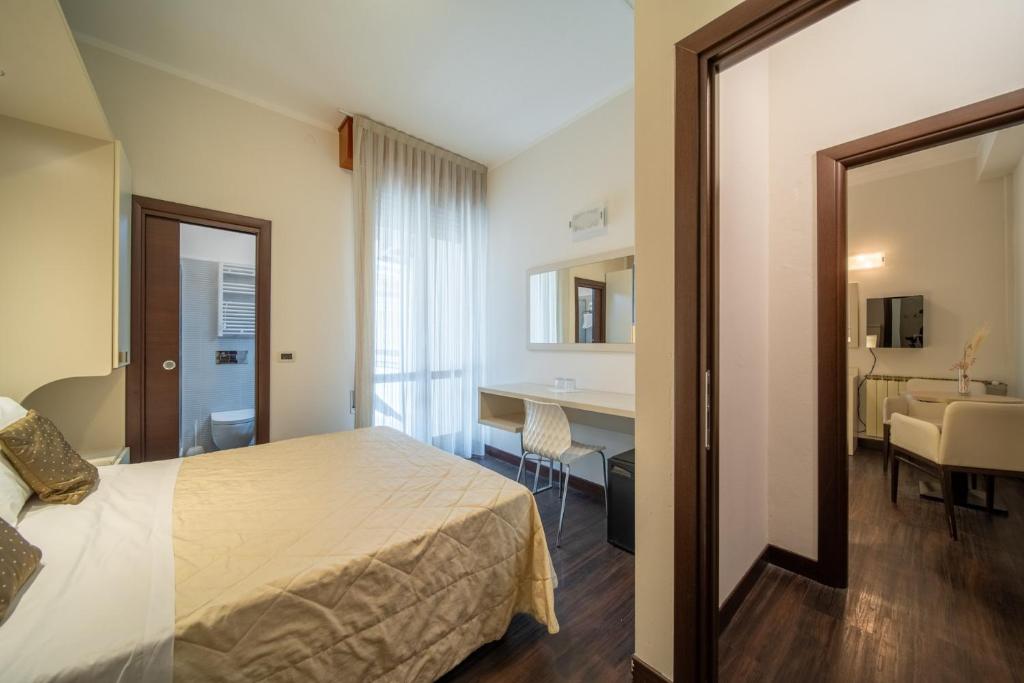 Postel nebo postele na pokoji v ubytování Hotel Lalla Beauty & Relax