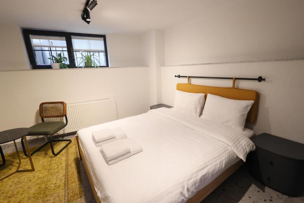 Postel nebo postele na pokoji v ubytování Evra Suites Hotel