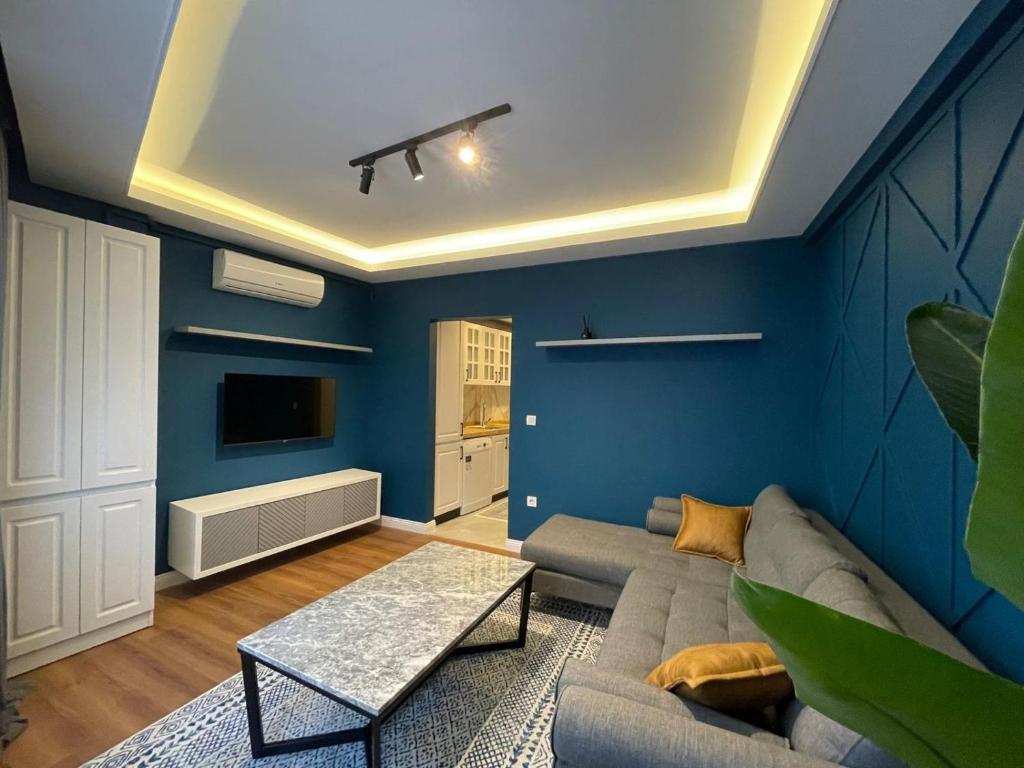 TV a/nebo společenská místnost v ubytování Evra Suites Hotel