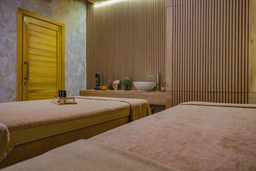 Postel nebo postele na pokoji v ubytování Vital Thermal Hotel & SPA
