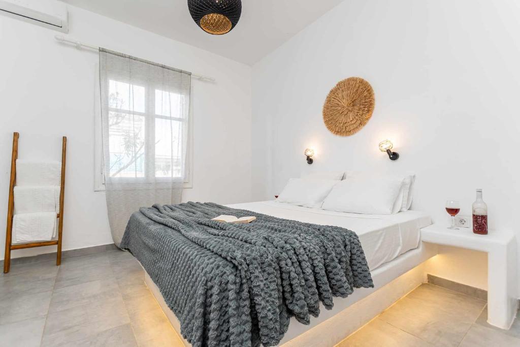 Posteľ alebo postele v izbe v ubytovaní Naxos Beachwalk Rooms