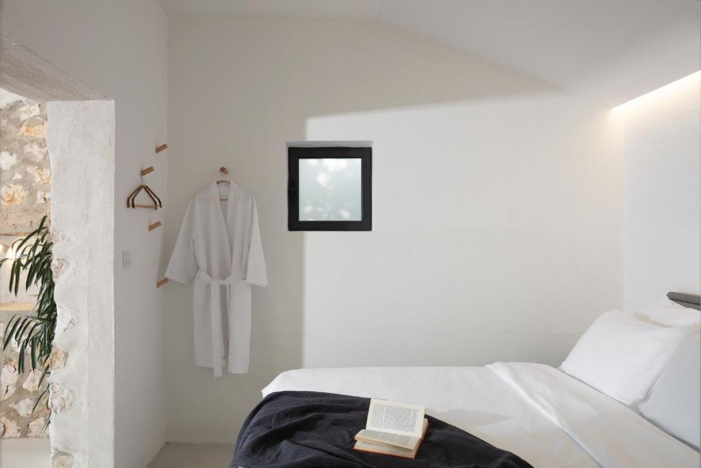 Postel nebo postele na pokoji v ubytování AB61 Tiny Design House for Two
