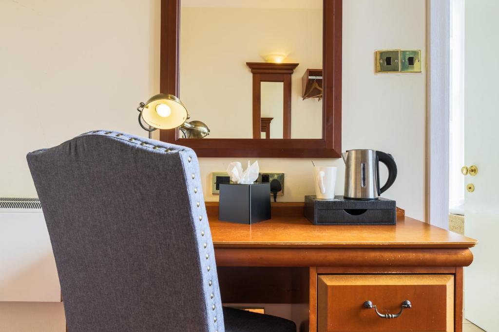 Příslušenství pro přípravu čaje a kávy v ubytování Old Waverley Hotel