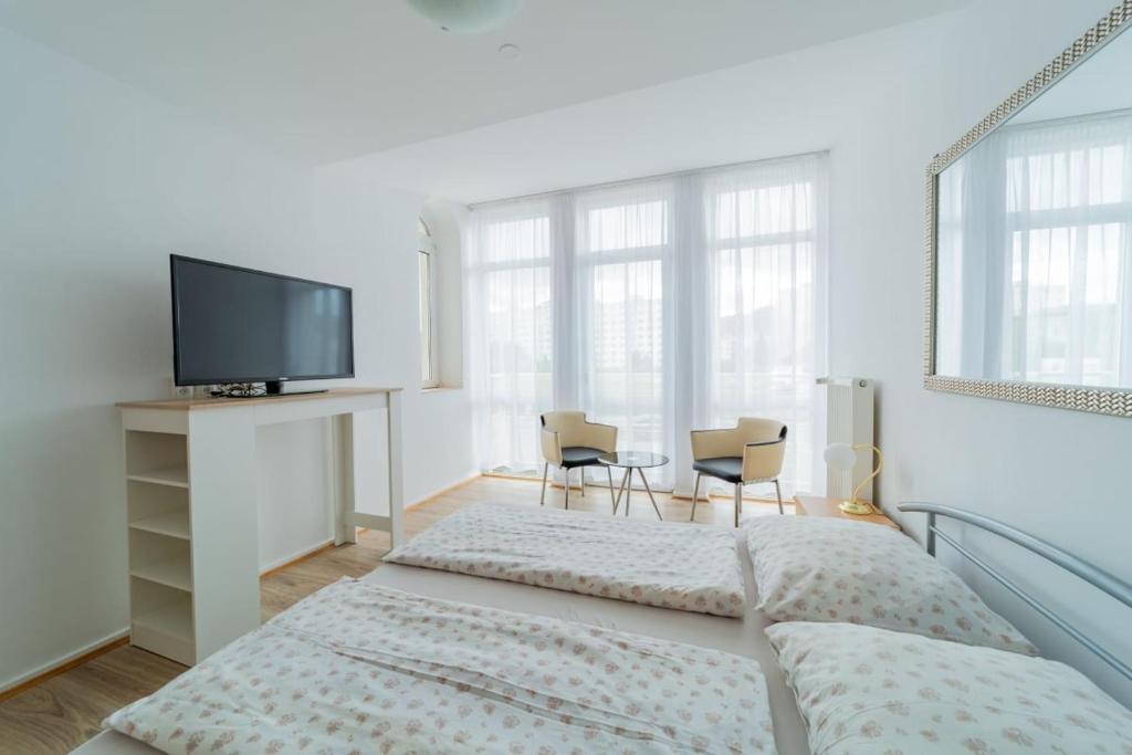 Postel nebo postele na pokoji v ubytování Hotel Palazzo