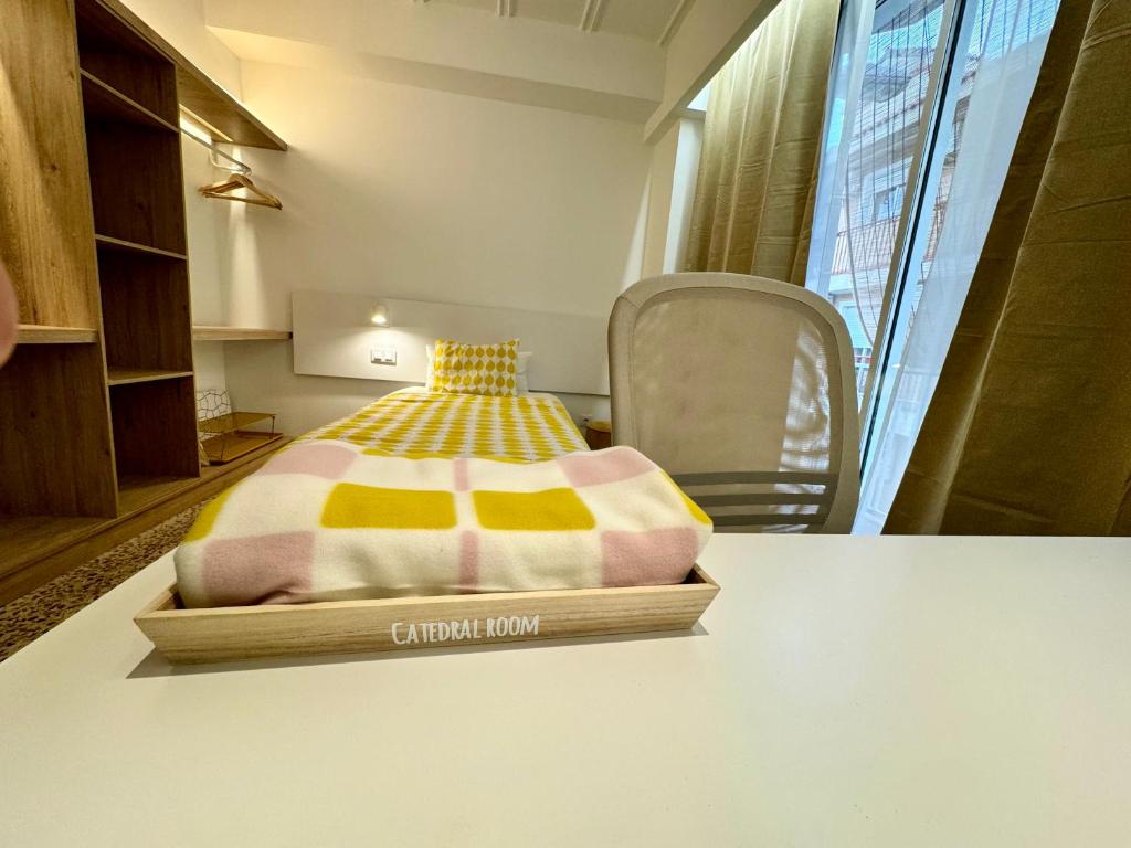 Postel nebo postele na pokoji v ubytování Guest House Espinardo