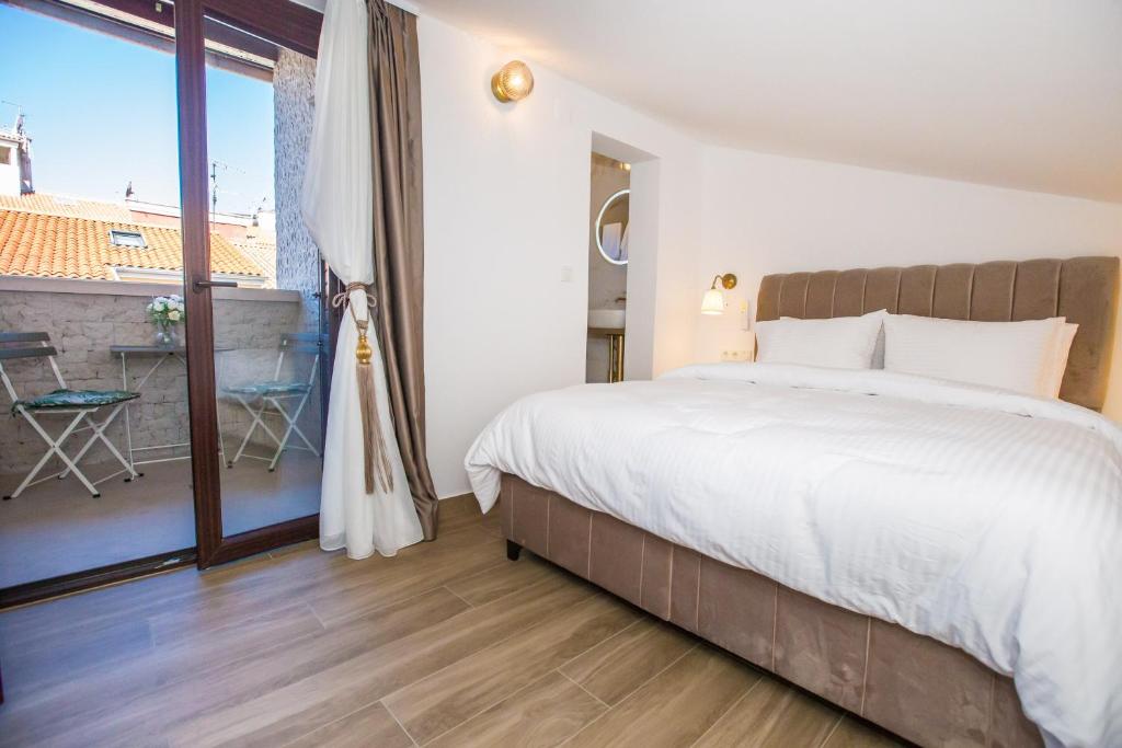 Postel nebo postele na pokoji v ubytování Mind apartment and rooms