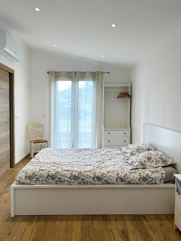 Postel nebo postele na pokoji v ubytování Le Petit Cabanon Provençal