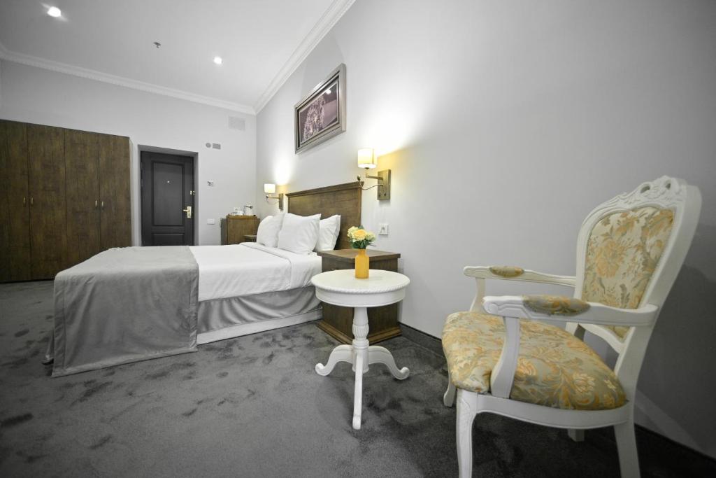 Postel nebo postele na pokoji v ubytování Address Hotel Yerevan by Imperial