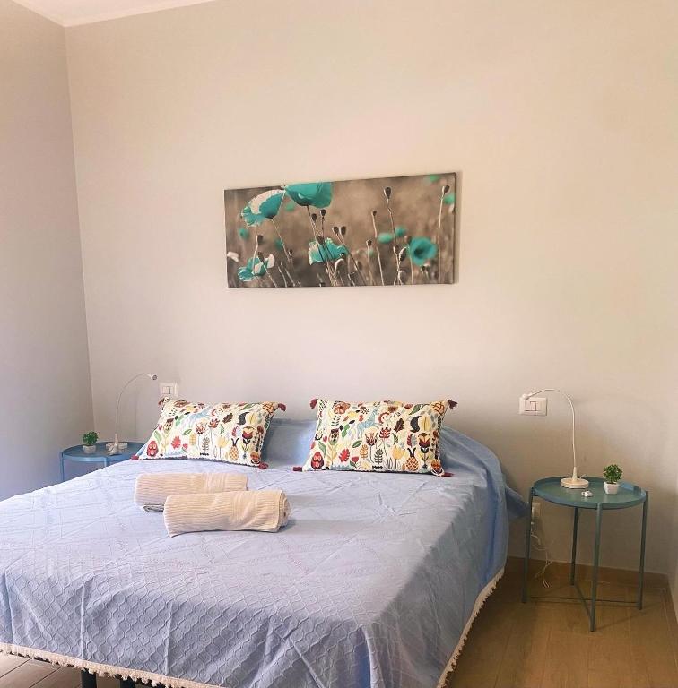Posteľ alebo postele v izbe v ubytovaní B&B MaLò Family Friendly
