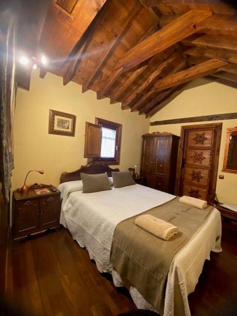 Postel nebo postele na pokoji v ubytování Hospederia Casa de Cisneros