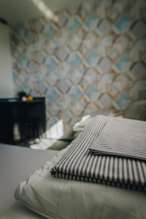 Posteľ alebo postele v izbe v ubytovaní Apartamenty Leśna