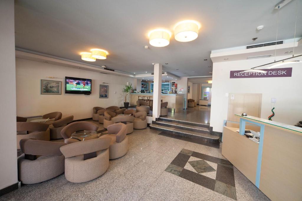 TV a/nebo společenská místnost v ubytování Hotel Lebed