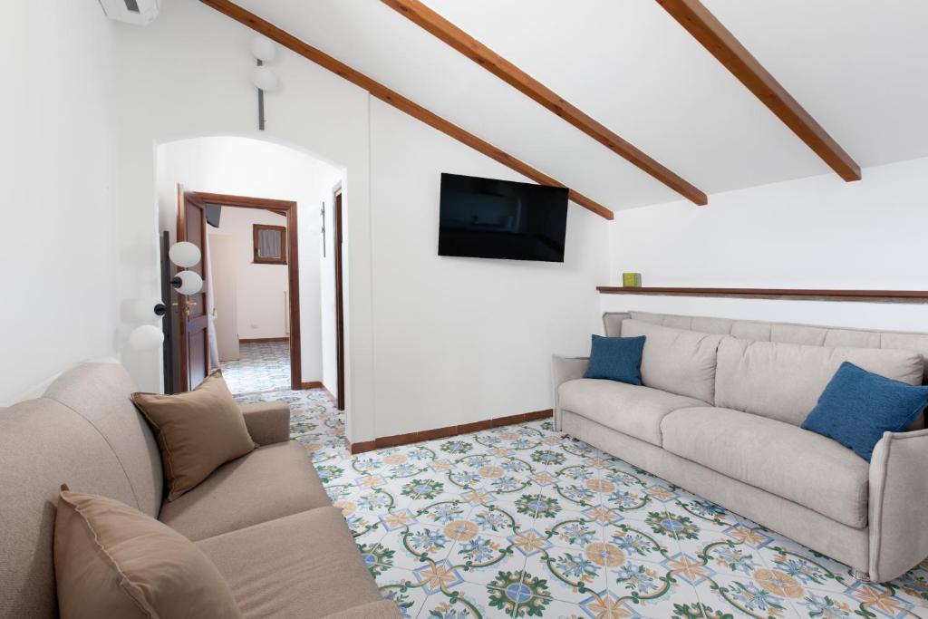 Posezení v ubytování YourHome - Jolly Pini Apartment