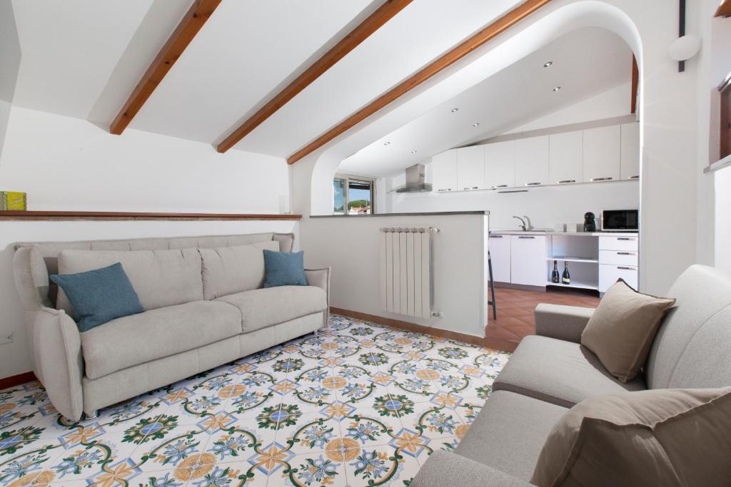 Kuchyň nebo kuchyňský kout v ubytování YourHome - Jolly Pini Apartment