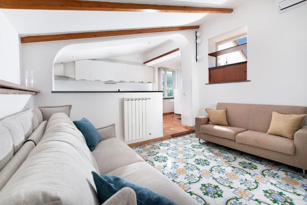 Posezení v ubytování YourHome - Jolly Pini Apartment