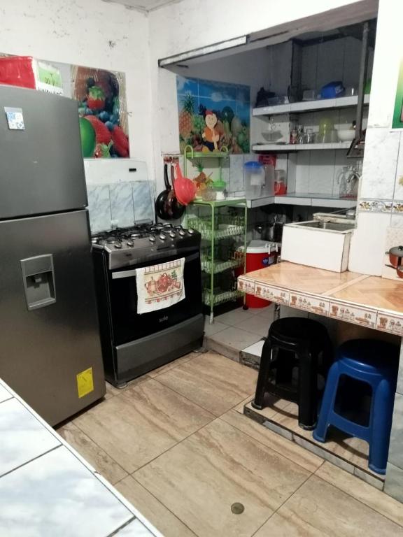 Kuchyň nebo kuchyňský kout v ubytování Posada Ternura