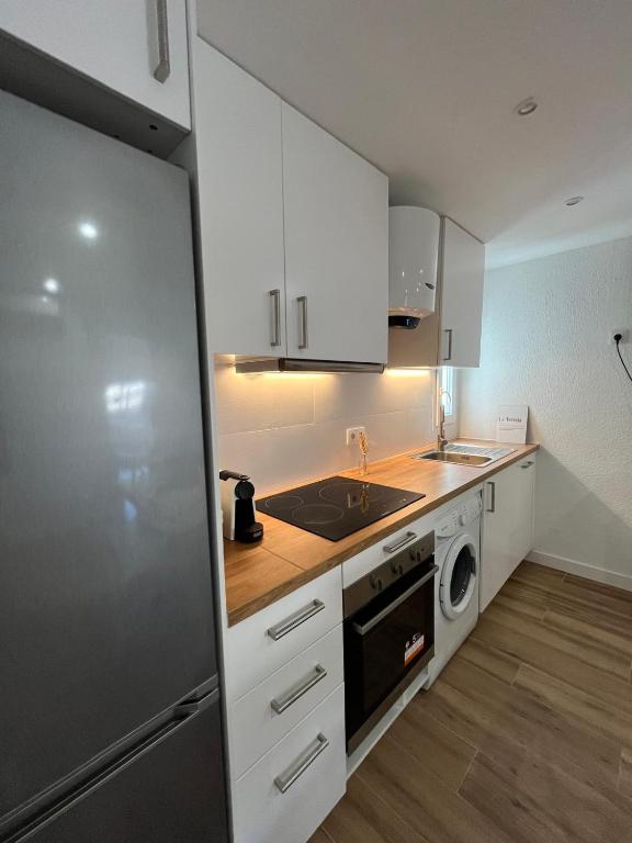 A kitchen or kitchenette at Apartamento Oasis Mediterráneo