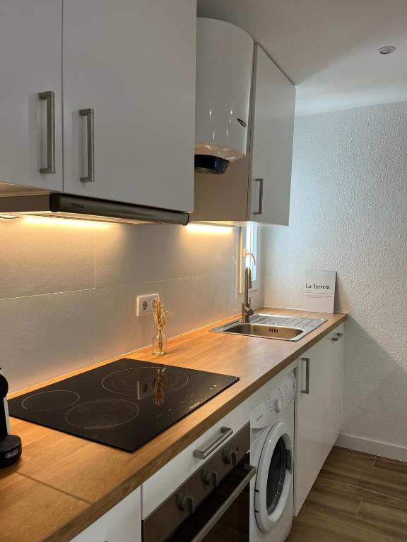 A kitchen or kitchenette at Apartamento Oasis Mediterráneo