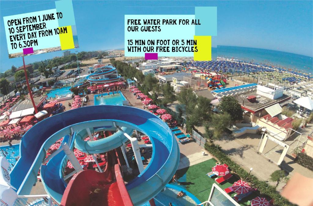 an image of a water park with a water slide at Hotel Giorg in Rimini