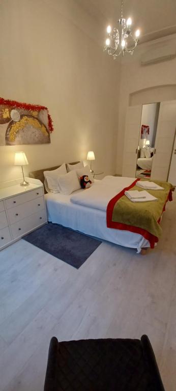 Posteľ alebo postele v izbe v ubytovaní Palace Apartment