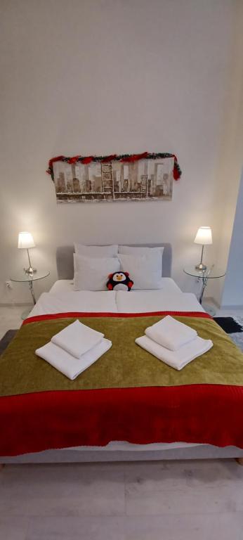 Posteľ alebo postele v izbe v ubytovaní Palace Apartment