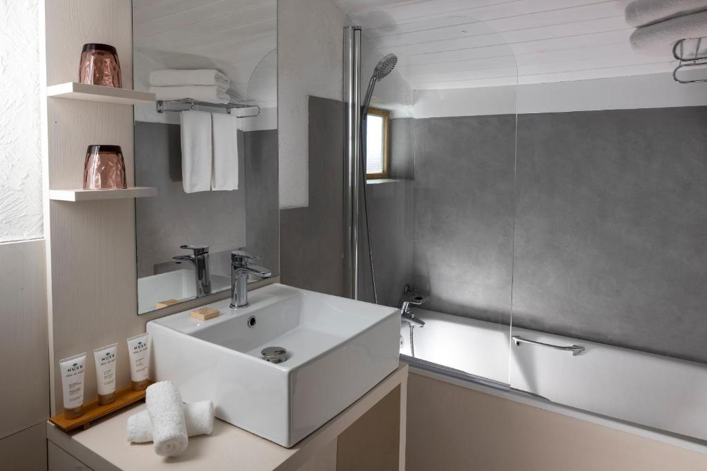 Koupelna v ubytování Hôtel Courcheneige
