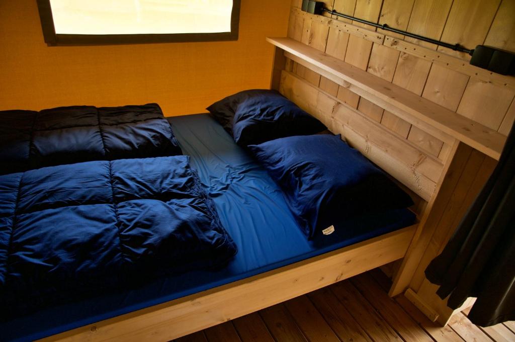 Postel nebo postele na pokoji v ubytování Kemp Sluknov- Glamping
