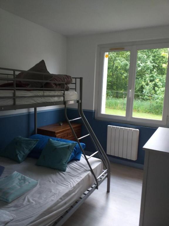 Posteľ alebo postele v izbe v ubytovaní Maison charmante à Villers-sous-Foucarmont avec jardin clôturé.