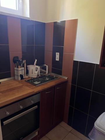 Kuchnia lub aneks kuchenny w obiekcie Dyta2 apartman