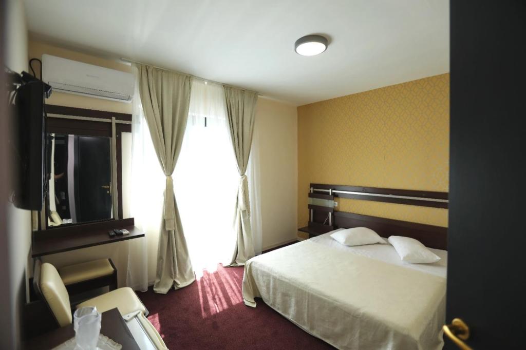 Postel nebo postele na pokoji v ubytování Casa Izabela