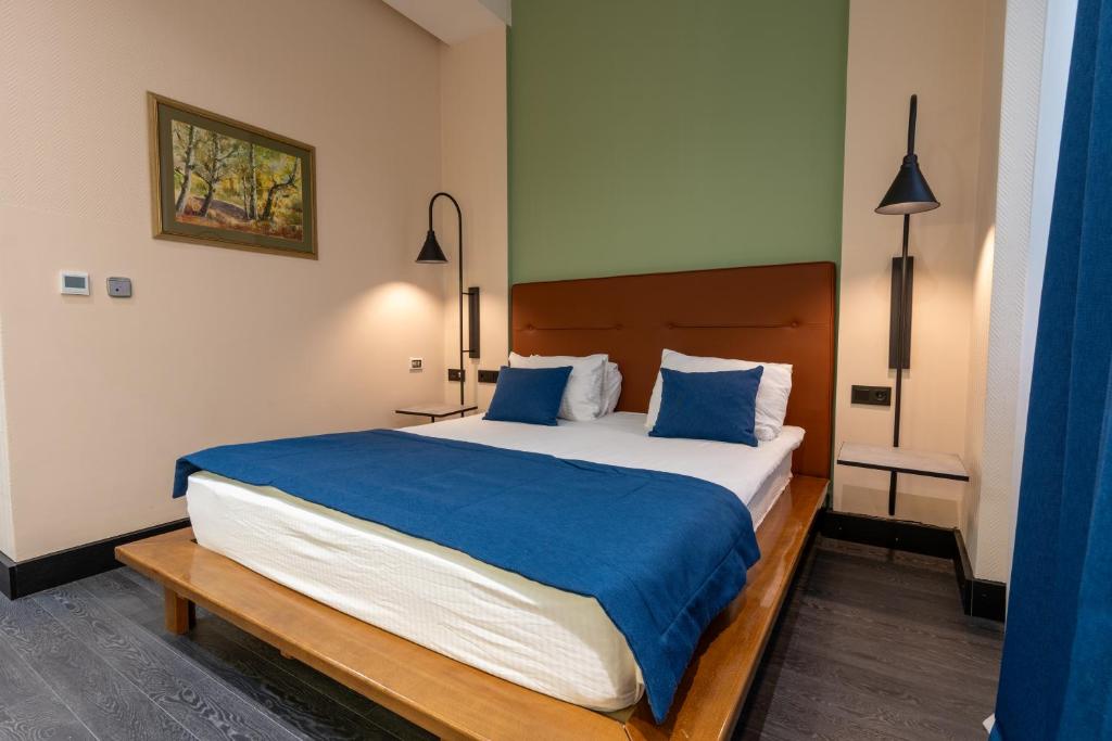 Postel nebo postele na pokoji v ubytování Hotel Astra