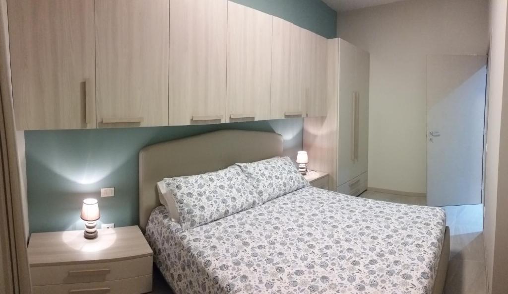 Postel nebo postele na pokoji v ubytování Appartamenti Moonlight