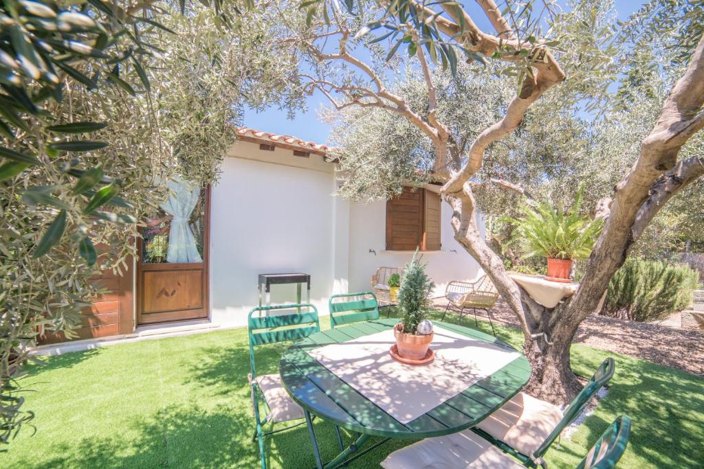 Dimora Lepori a Solanas - Oasi con giardino e biciclette