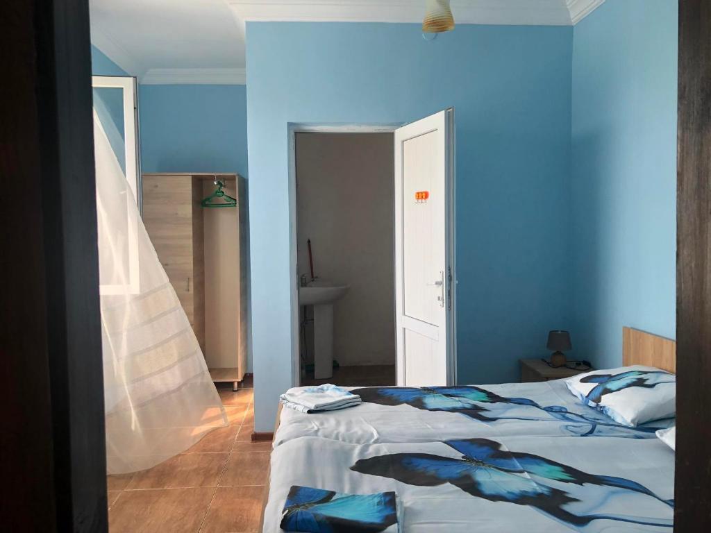 Postel nebo postele na pokoji v ubytování Отел Нана