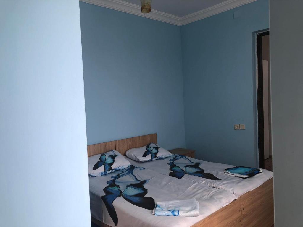 Postel nebo postele na pokoji v ubytování Отел Нана