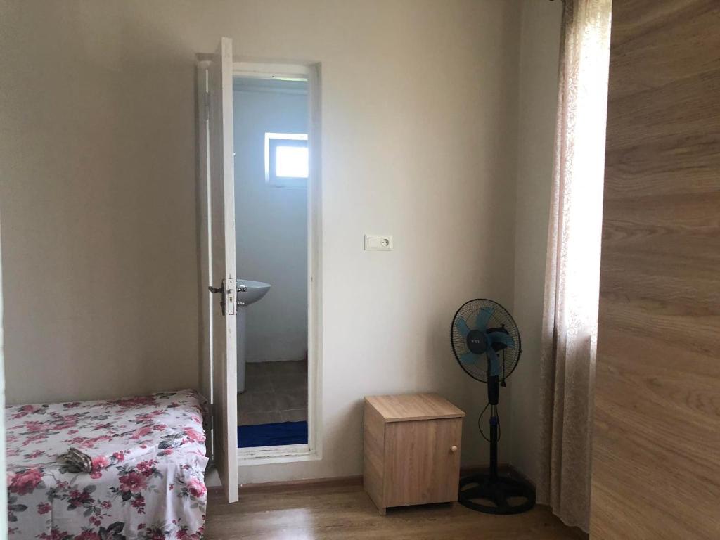 Postel nebo postele na pokoji v ubytování Отел Нана