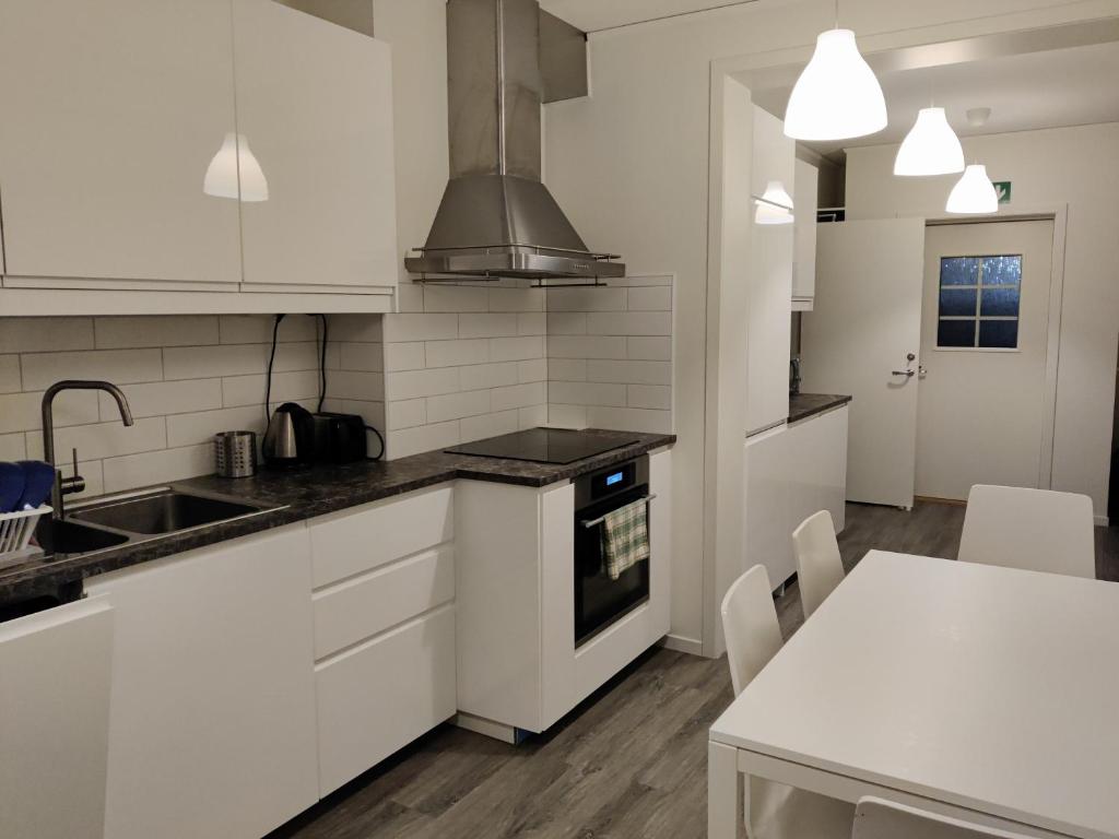 Kuchyň nebo kuchyňský kout v ubytování Lilla Hotellet i Nybro