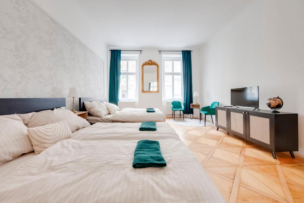Postel nebo postele na pokoji v ubytování City center premium apartment Bohemia