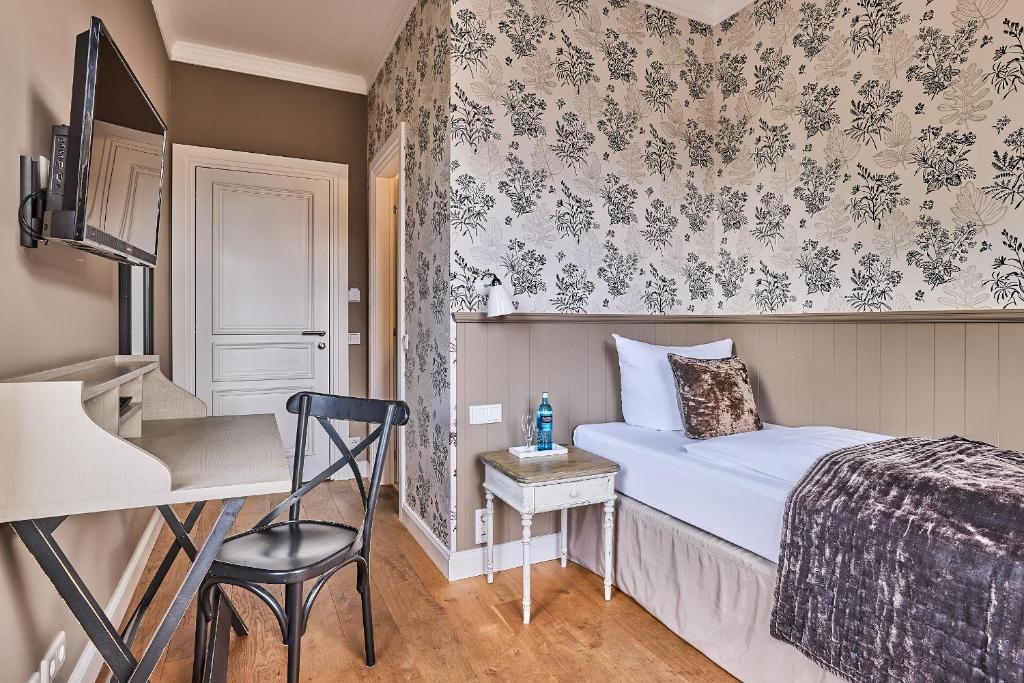 Postel nebo postele na pokoji v ubytování Hollenstedter Hof