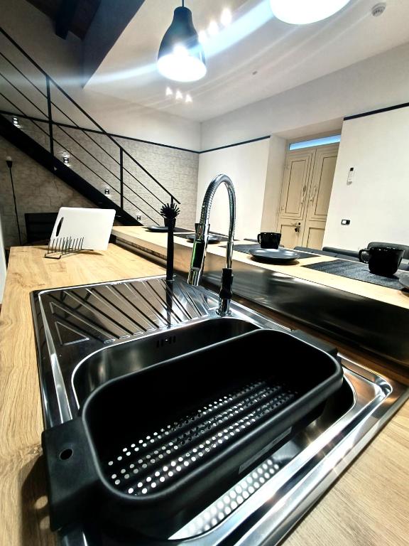 Kuchyň nebo kuchyňský kout v ubytování Ti Scialìi Loft