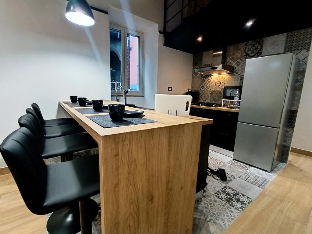 Kuchyň nebo kuchyňský kout v ubytování Ti Scialìi Loft