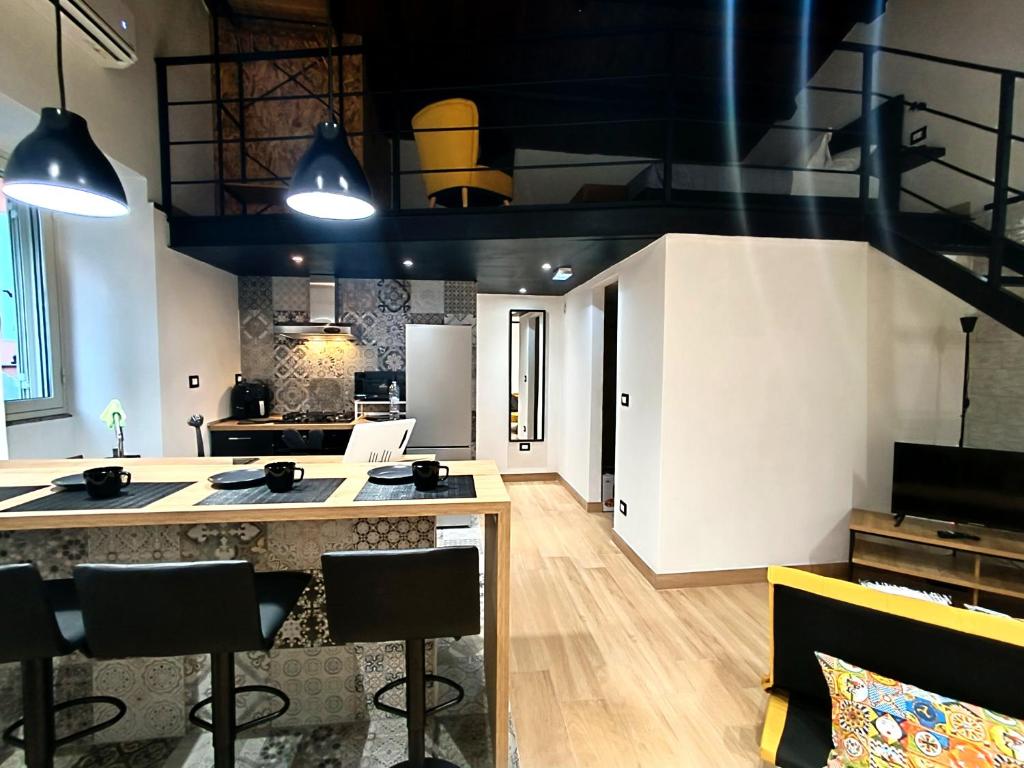 Kuchyň nebo kuchyňský kout v ubytování Ti Scialìi Loft